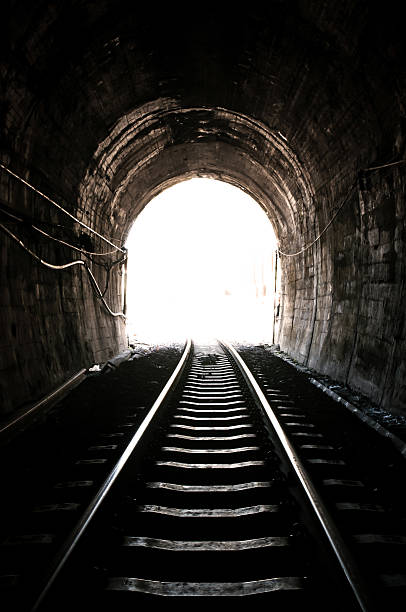 istock Light at the end of railroad tunnel 470178715