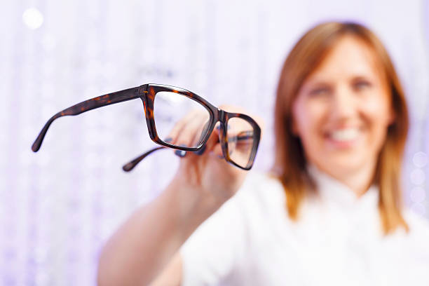 istock At the optician  Chooses  glasses   Ophthalmology   Optical store 470180334