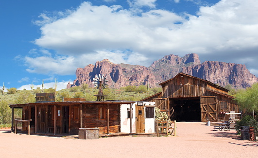 Abandoned old Wild West Cowboy Town used during the gold rush with mountains in background