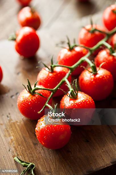 Raw Organic Red Cherry Tomatoes Stock Photo - Download Image Now - 2015, Cherry Tomato, Dieting