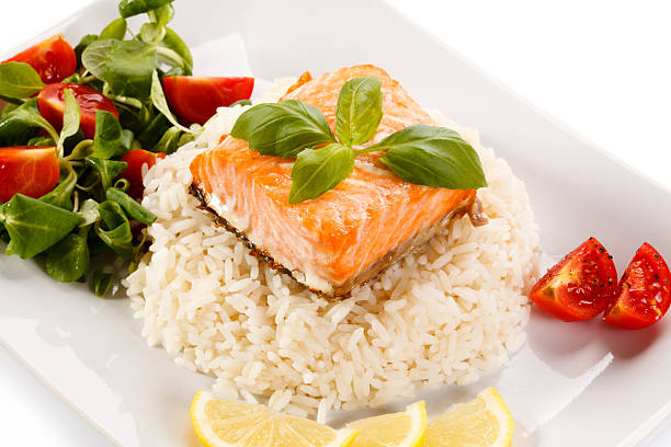 istock Grilled salmon, white rice and vegetables 470181680