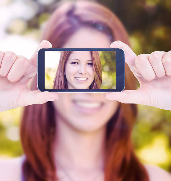 istock Composite image of hands holding smartphone 470181886