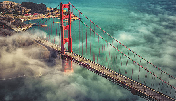 san francisco golden gate bridge - san francisco county bridge california fog stock-fotos und bilder