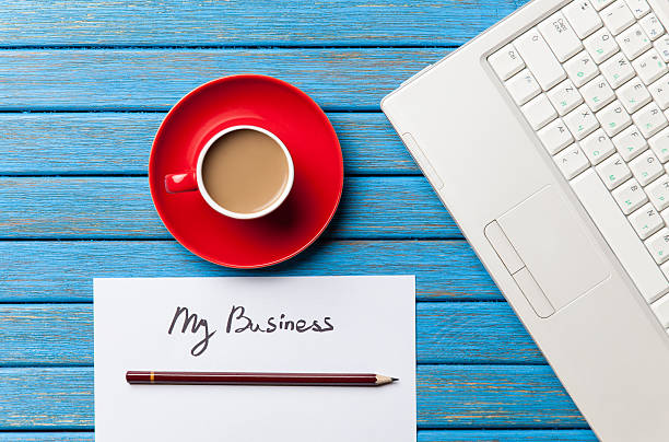 istock coffee and paper with My Business words near notebook 470185350