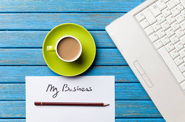 istock coffee and paper with My Business words near notebook 470185364