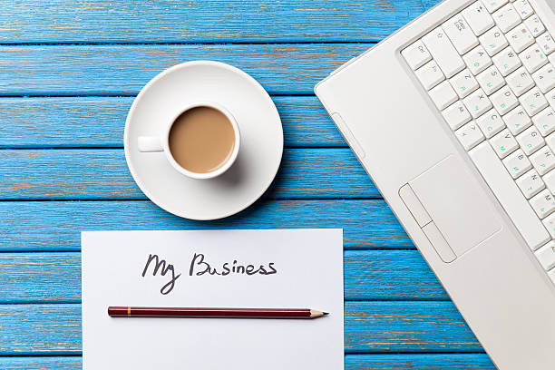 istock coffee and paper with My Business words near notebook 470185368