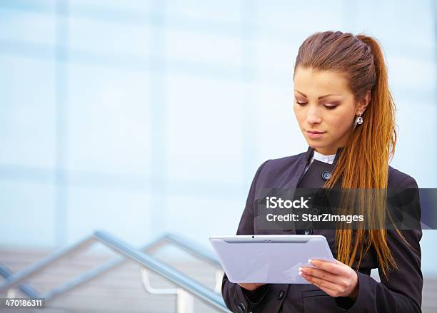 Businesswoman Working On Digital Tablet Out Of Office Overlooki Stock Photo - Download Image Now