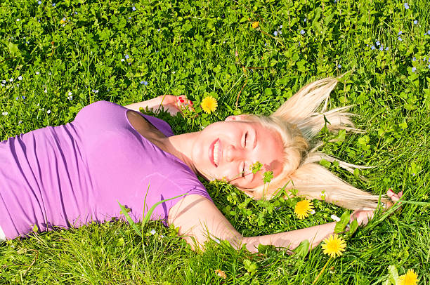 istock woman on the meadow 470189065