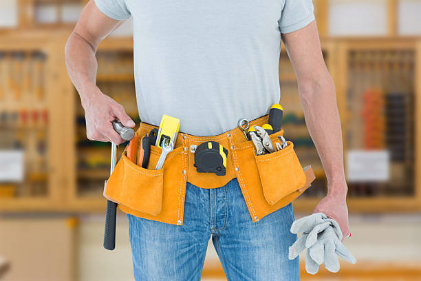 istock Composite image of technician holding gloves and hammer 470193014