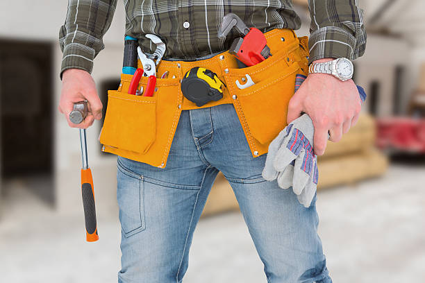 istock Composite image of manual worker holding gloves and hammer 470193082