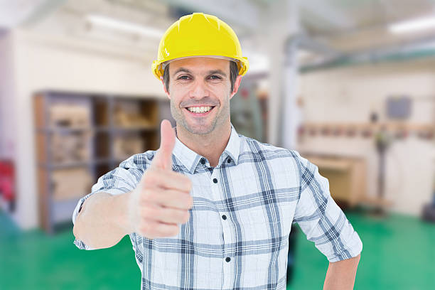istock Composite image of architect showing thumbs up over white background 470193452
