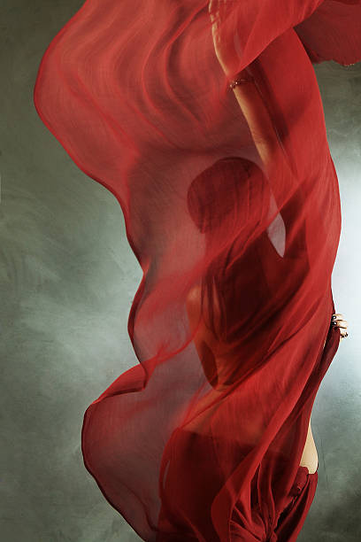 istock girl with red silk cloth 470193600