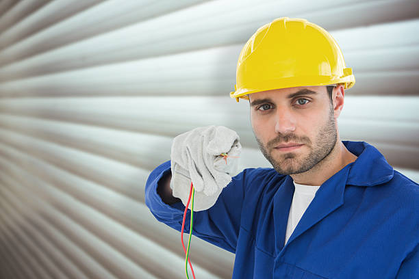 Composite image of confident repairman holding cables