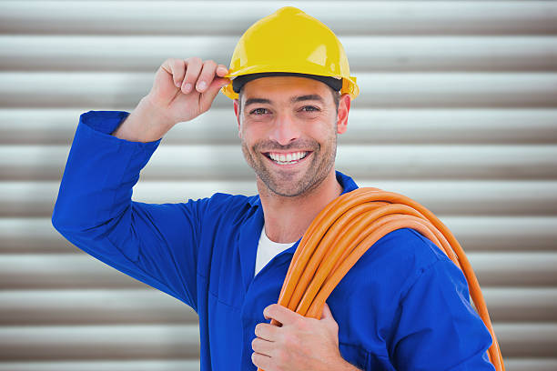 Composite image of confident repairman
