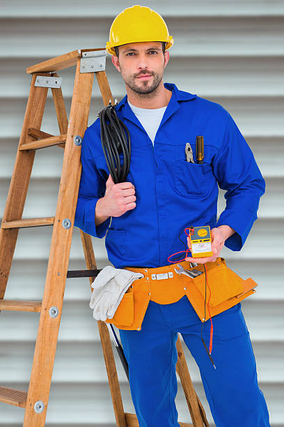 istock Composite image of electrician holding cables and multimeter 470193936