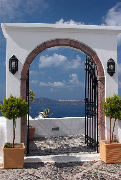 terrace in santorini island, greece - santorini door sea gate bildbanksfoton och bilder