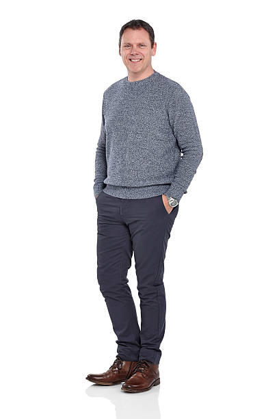 istock Handsome mature man standing with his hands in pocket 470198414