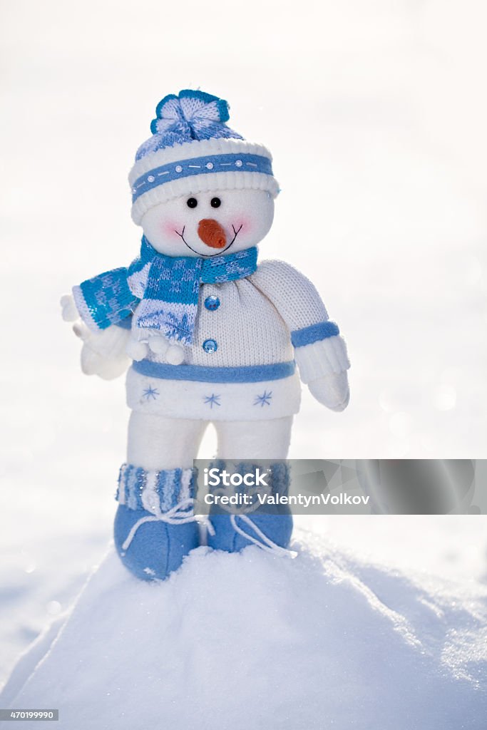 Little snowman with carrot nose. Little snowman with carrot nose in the snow. 2015 Stock Photo