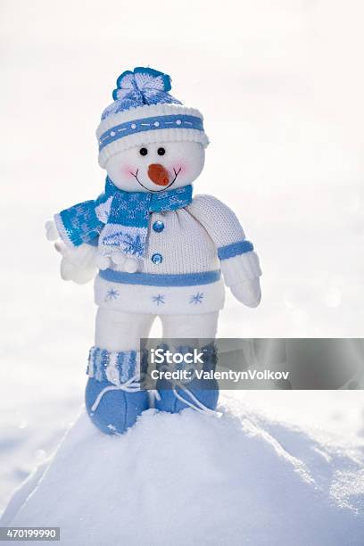 Little Snowman With Carrot Nose Stock Photo - Download Image Now - 2015, Backgrounds, Blue