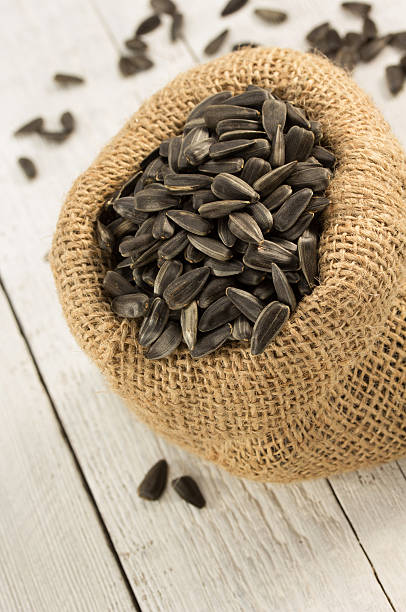 istock sunflower seeds in bag on wood 470200536