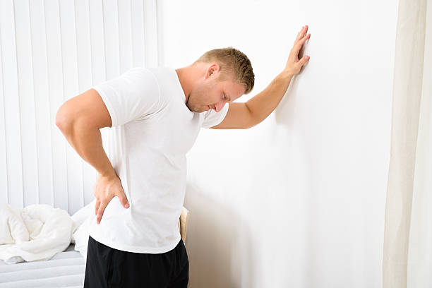 istock Young Man Having Pain In His Back 470200868