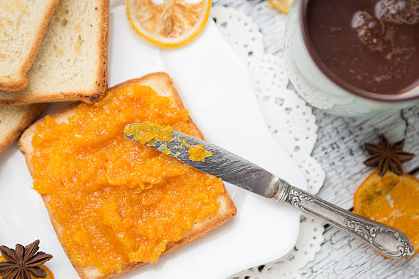 istock toast bread with jam on vintage wooden table 470203334