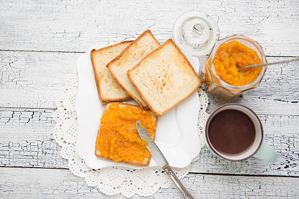 istock toast bread with jam on vintage wooden table 470203340