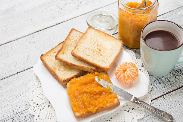 istock toast bread with jam on vintage wooden table 470203344