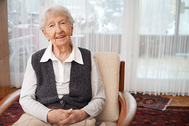 90 year old lady at home stock photo