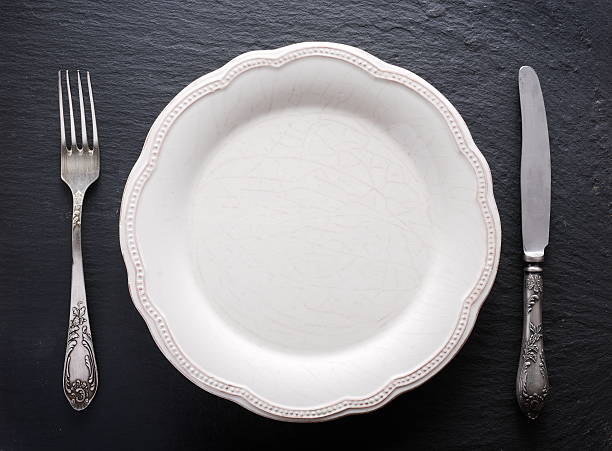 istock Silver cutlery and vintage plate. 470203846