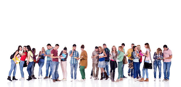 istock Large group of young multi-tasking students isolated on white. 470203964
