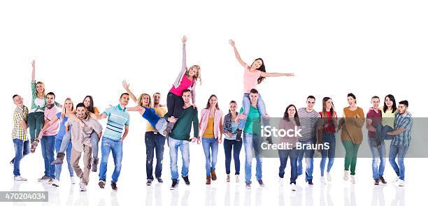 Group Of Playful Young People Isolated On White Stock Photo - Download Image Now - Group Of People, Walking, White Background