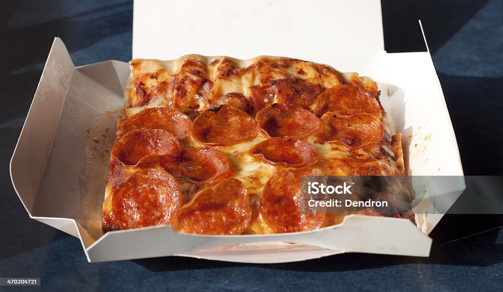 Pepperoni Pizza A slice of pepperoni pizza Cheese Stock Photo