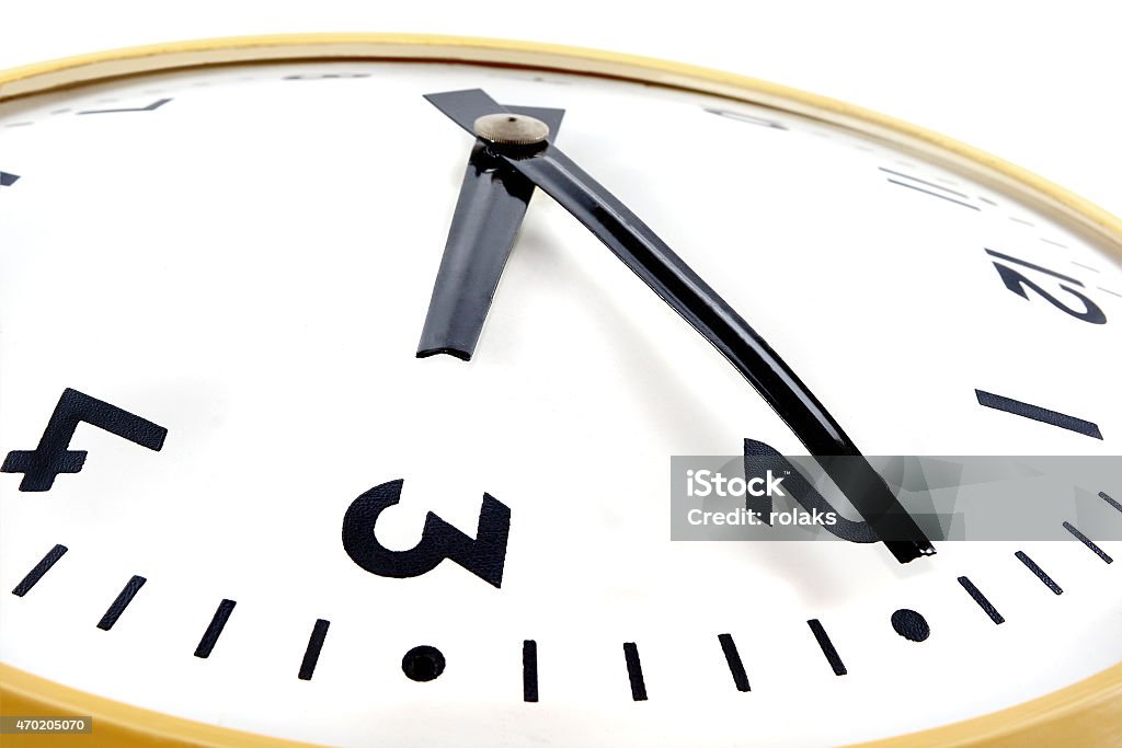 Clock Part of the mechanical clock isolated on a white background 2015 Stock Photo