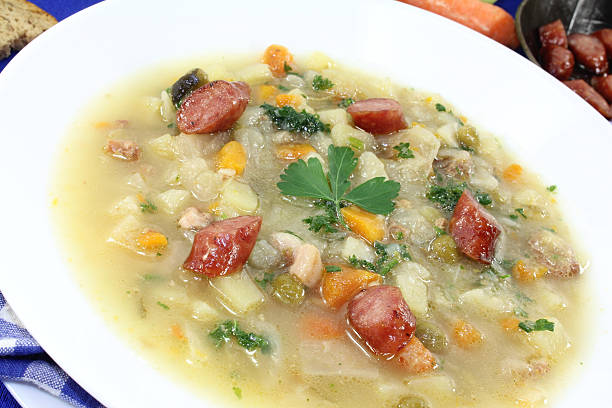 istock hot hearty cabbage soup with Mettwurst sausage 470205758