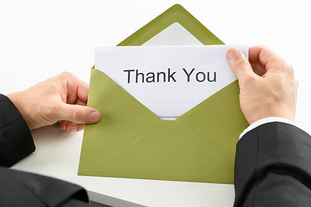 istock Businessman Holding Thank You Card 470206434