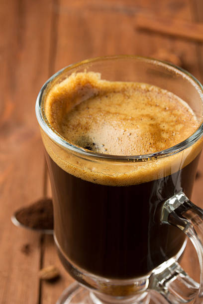 istock cup of coffee on wood 470209350