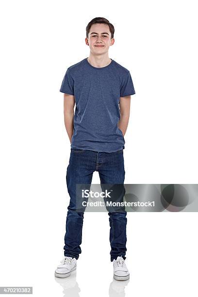 Cute Young Boy Looking At Camera Smiling Stock Photo - Download Image Now - Teenage Boys, Boys, Teenager