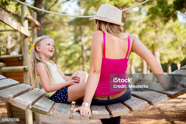 Children Learn To Smile From Their Parents Stock Photo - Download Image Now - 2015, Adult, Blond Hair