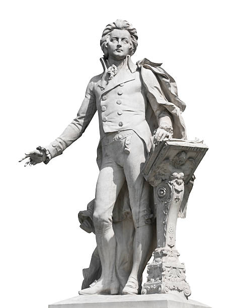Statue of Wolfgang Amadeus Mozart, located in the Burggarten in Vienna "Statue of Wolfgang Amadeus Mozart, located in the Burggarten in Vienna. Isolated on white background. Selective Focus wolfgang amadeus mozart photos stock pictures, royalty-free photos & images