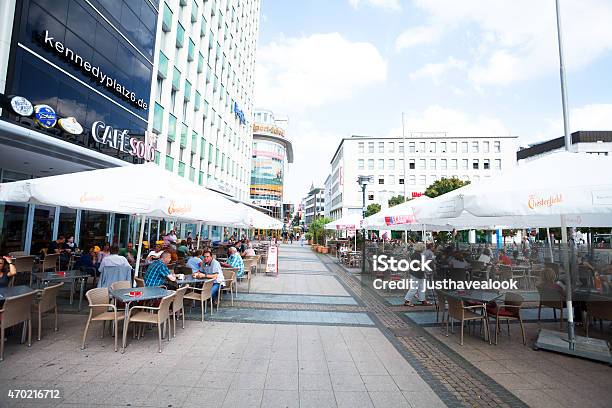 People Outside Of Cafe At Square Kennedyplatz In Essen Stock Photo - Download Image Now