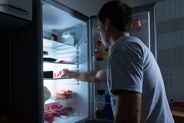 istock Man Taking Food From Fridge 470217398