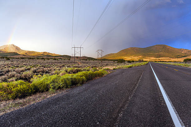 istock Rainbow Over Road 153 Towards Beaver Utah USA 470217666
