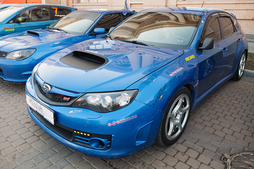 Saint-Petersburg, Russia - April 11, 2015: Blue Pre-facelift Subaru Impreza WRX STI car stands parked on the city street