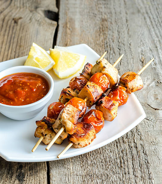 istock Grilled chicken skewers with lemon 470228953