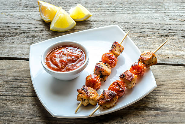 istock Grilled chicken skewers with cherry tomatoes 470228999