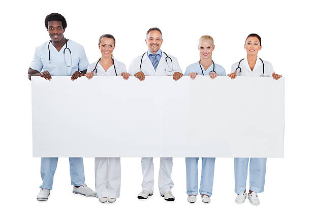 istock Confident Medical Team Holding Blank Billboard 470231620