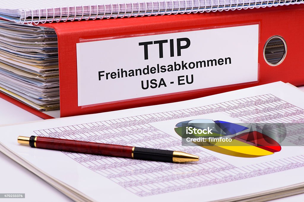 TTIP free trade agreement TTIP is the abbreviation for - Transatlantic Trade and Investment Partnership -  between USA and Europe marked on file folder with documents. 2015 Stock Photo