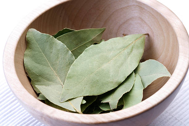 istock Laurer leafs in wooden bowl 470233786