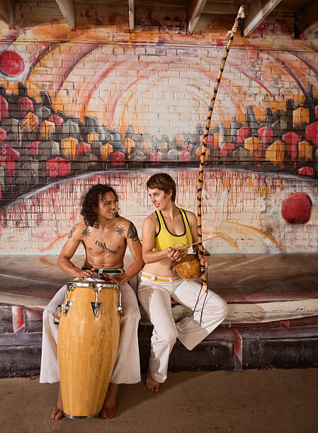 istock Capoeira Couple Playing Music 470234511